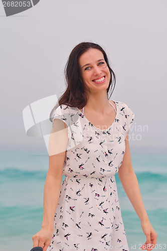 Image of Happy Beautiful Woman Enjoying Summer Vacation