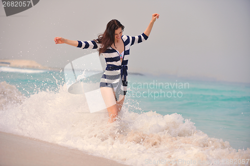 Image of Happy Beautiful Woman Enjoying Summer Vacation