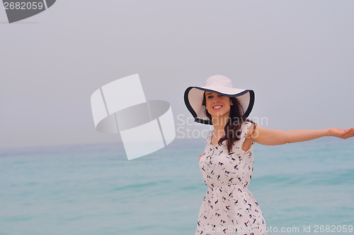 Image of Happy Beautiful Woman Enjoying Summer Vacation