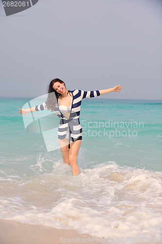 Image of Happy Beautiful Woman Enjoying Summer Vacation