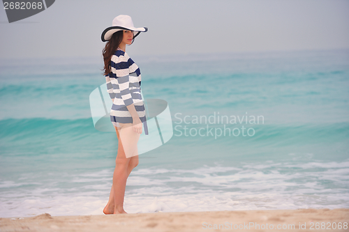 Image of Happy Beautiful Woman Enjoying Summer Vacation
