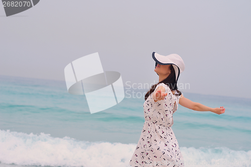Image of Happy Beautiful Woman Enjoying Summer Vacation