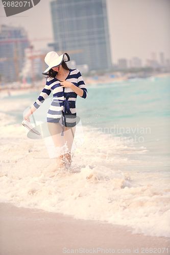 Image of Happy Beautiful Woman Enjoying Summer Vacation