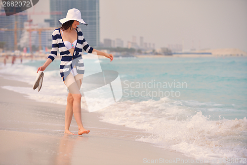 Image of Happy Beautiful Woman Enjoying Summer Vacation