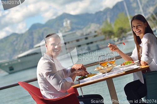 Image of couple having lanch at beautiful restaurant