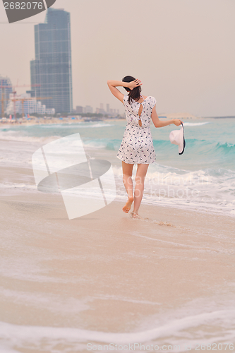 Image of Happy Beautiful Woman Enjoying Summer Vacation