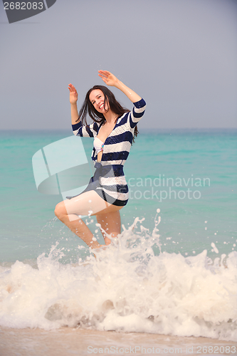 Image of Happy Beautiful Woman Enjoying Summer Vacation