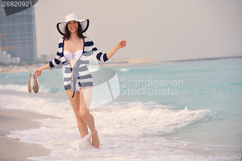 Image of Happy Beautiful Woman Enjoying Summer Vacation