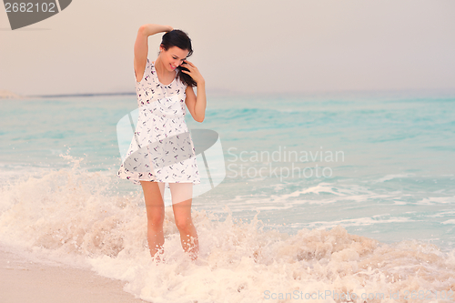 Image of Happy Beautiful Woman Enjoying Summer Vacation