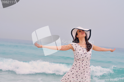 Image of Happy Beautiful Woman Enjoying Summer Vacation