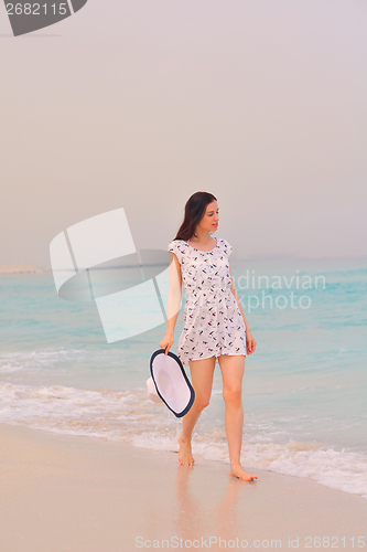 Image of Happy Beautiful Woman Enjoying Summer Vacation