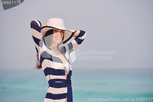Image of Happy Beautiful Woman Enjoying Summer Vacation