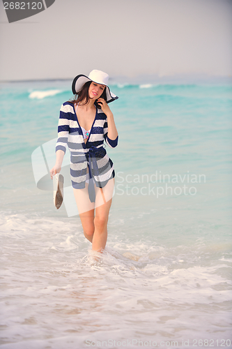Image of Happy Beautiful Woman Enjoying Summer Vacation