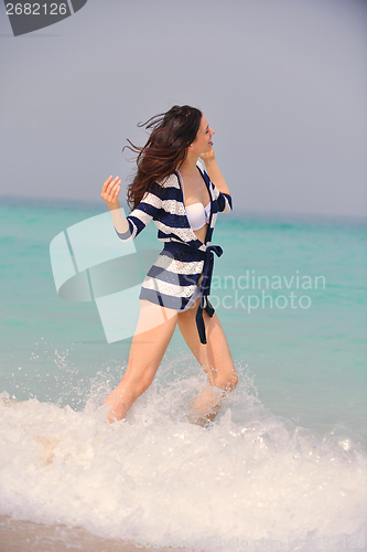 Image of Happy Beautiful Woman Enjoying Summer Vacation