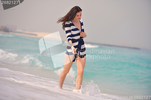 Image of Happy Beautiful Woman Enjoying Summer Vacation