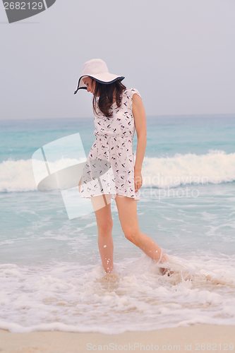 Image of Happy Beautiful Woman Enjoying Summer Vacation