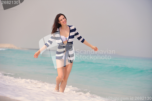 Image of Happy Beautiful Woman Enjoying Summer Vacation