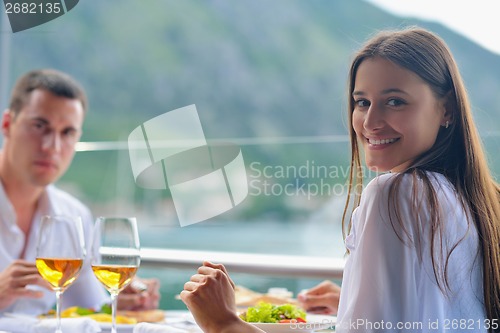 Image of couple having lanch at beautiful restaurant