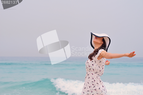 Image of Happy Beautiful Woman Enjoying Summer Vacation