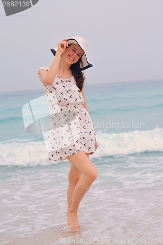 Image of Happy Beautiful Woman Enjoying Summer Vacation