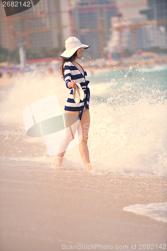 Image of Happy Beautiful Woman Enjoying Summer Vacation