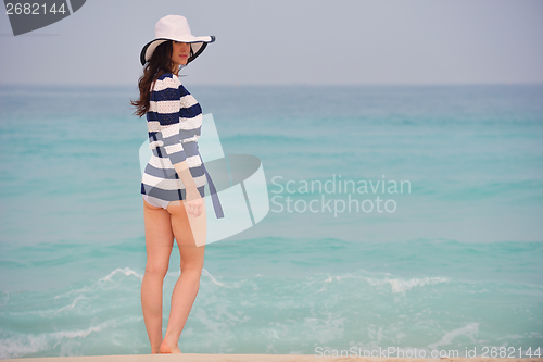 Image of Happy Beautiful Woman Enjoying Summer Vacation