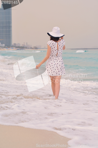 Image of Happy Beautiful Woman Enjoying Summer Vacation