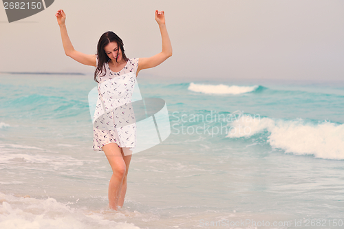 Image of Happy Beautiful Woman Enjoying Summer Vacation