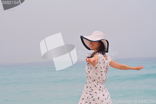 Image of Happy Beautiful Woman Enjoying Summer Vacation