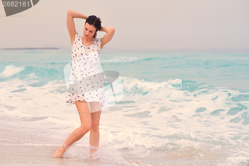 Image of Happy Beautiful Woman Enjoying Summer Vacation