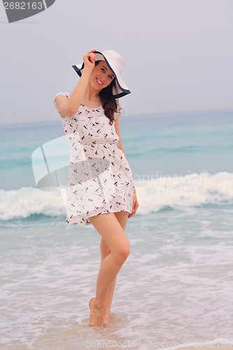 Image of Happy Beautiful Woman Enjoying Summer Vacation