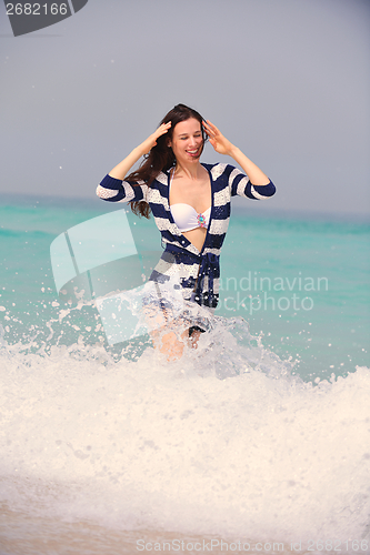 Image of Happy Beautiful Woman Enjoying Summer Vacation