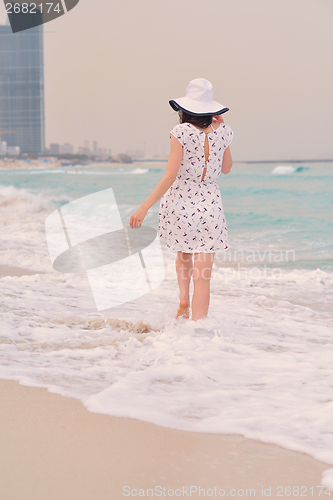 Image of Happy Beautiful Woman Enjoying Summer Vacation