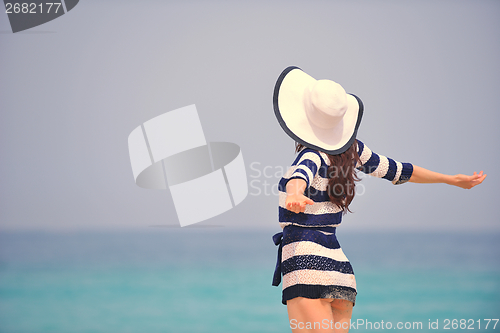 Image of Happy Beautiful Woman Enjoying Summer Vacation