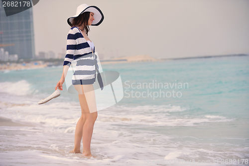 Image of Happy Beautiful Woman Enjoying Summer Vacation