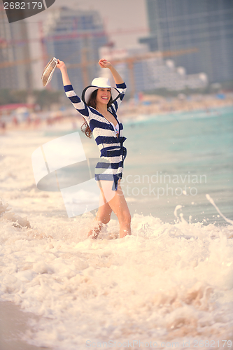 Image of Happy Beautiful Woman Enjoying Summer Vacation