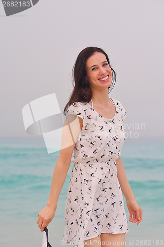 Image of Happy Beautiful Woman Enjoying Summer Vacation