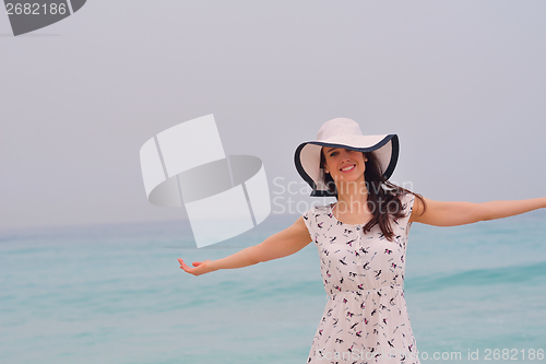 Image of Happy Beautiful Woman Enjoying Summer Vacation