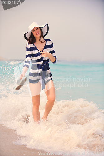 Image of Happy Beautiful Woman Enjoying Summer Vacation