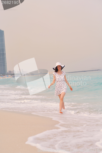 Image of Happy Beautiful Woman Enjoying Summer Vacation