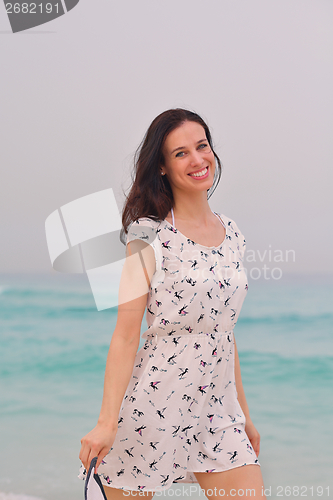 Image of Happy Beautiful Woman Enjoying Summer Vacation