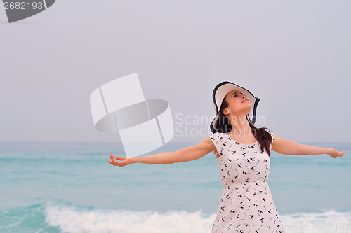 Image of Happy Beautiful Woman Enjoying Summer Vacation
