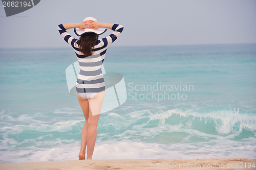 Image of Happy Beautiful Woman Enjoying Summer Vacation