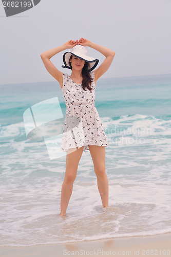 Image of Happy Beautiful Woman Enjoying Summer Vacation