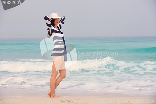 Image of Happy Beautiful Woman Enjoying Summer Vacation
