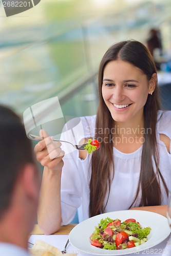 Image of couple having lanch at beautiful restaurant