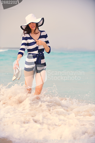 Image of Happy Beautiful Woman Enjoying Summer Vacation