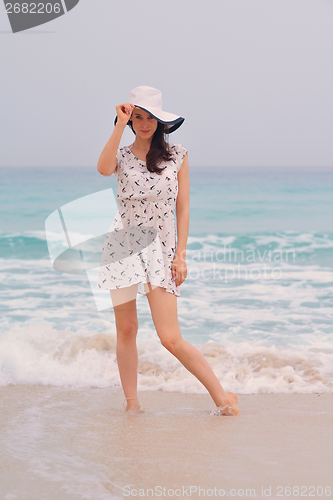 Image of Happy Beautiful Woman Enjoying Summer Vacation