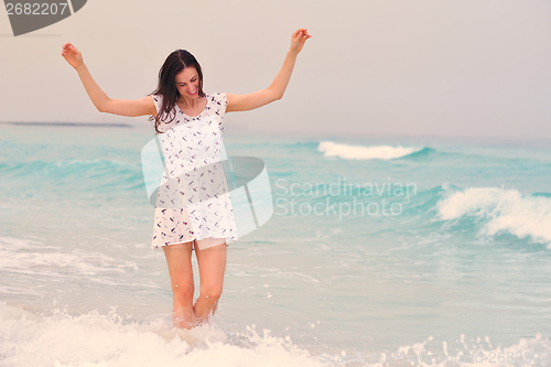Image of Happy Beautiful Woman Enjoying Summer Vacation
