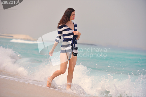 Image of Happy Beautiful Woman Enjoying Summer Vacation